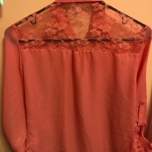 Pink button tie bottom blouse with sheer lace